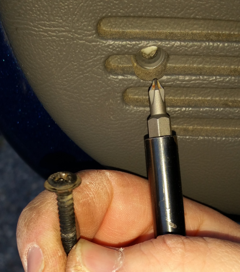 Lower Rear Corner of Door Panel. No.1 Phillips Screw.